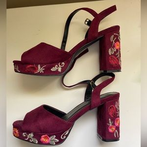 Embroidered maroon platform heels